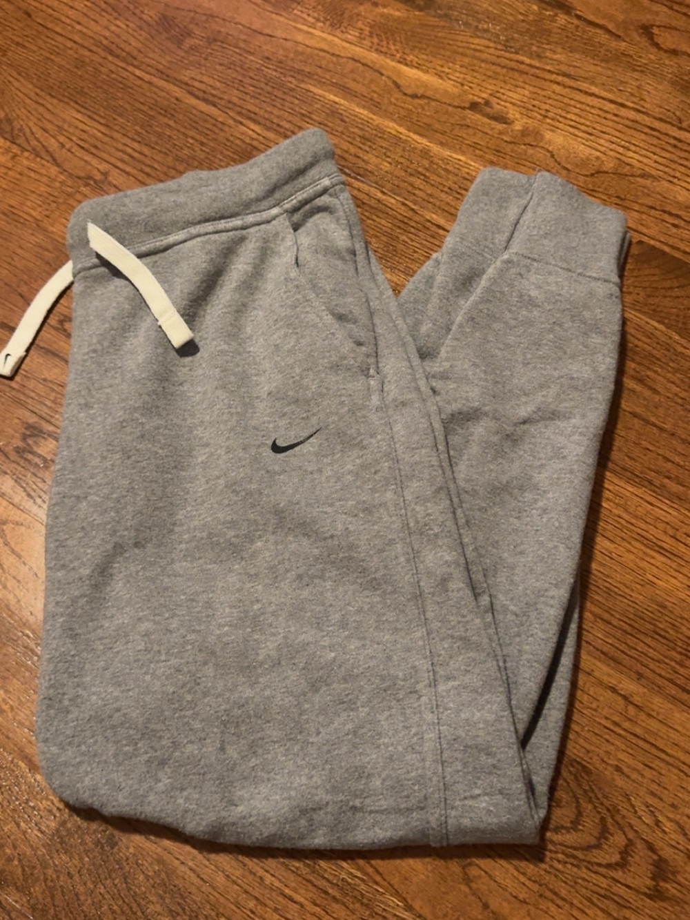 Nike Women’s Light Gray Fleece Joggers with Swoosh